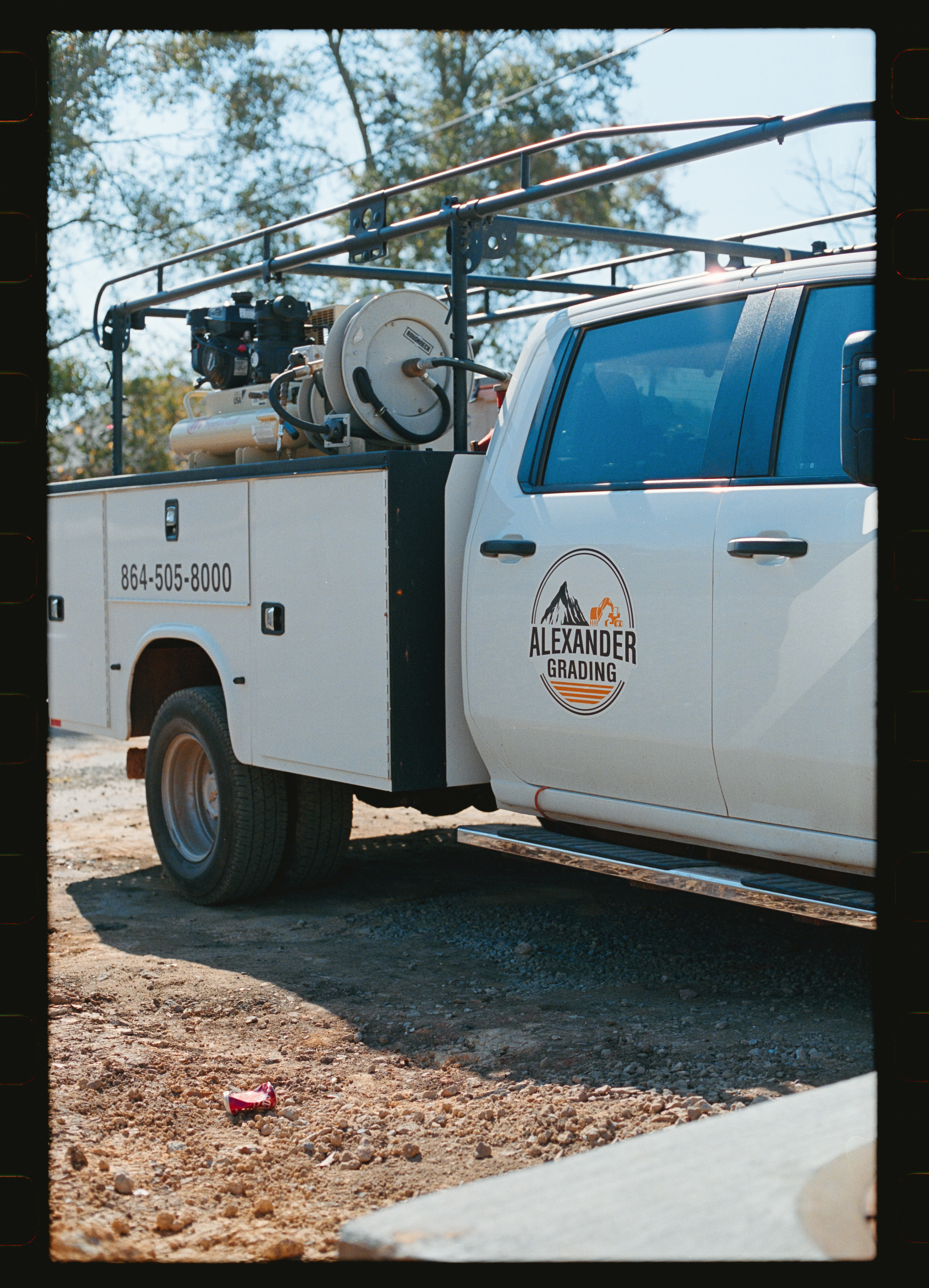 Alexander Grading branded truck
